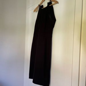 Black tight, knee length form fitting dress